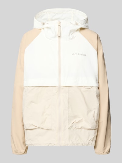 Produktfoto, Windbreaker mit Rückenbelüftungssystem und Kapuze von Columbia in Beige und Weiß, wasser- und schmutzabweisend, elastische Bündchen.