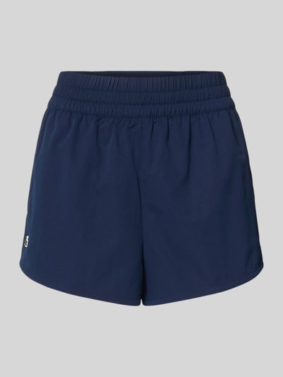Produktfoto, Regular Fit Sport-Shorts mit Logo-Applikation von Lacoste Sport in Dunkelblau, Piqué-Stretch, elastischer Bund, unifarben
