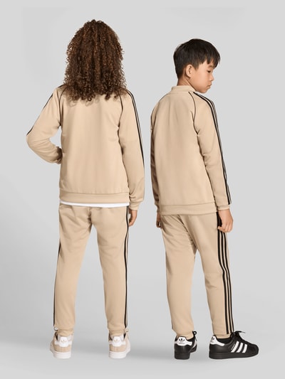 adidas Originals Spodnie dresowe krój regular fit z koniczyną Trefoil Beżowy 5