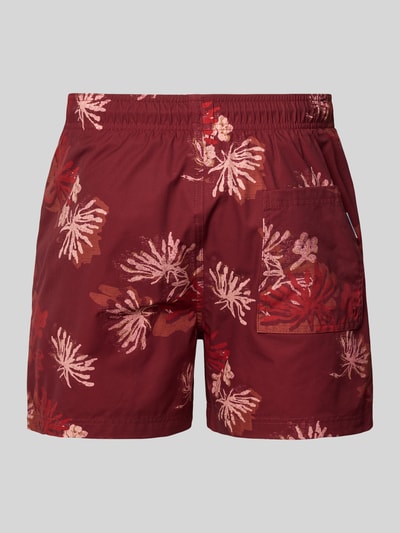 Produktfoto, Regular Fit Badeshorts mit Allover-Animal-Print Modell 'Maui' von Jack & Jones für Herren, elastischer Bund mit Tunnelzug, dunkelrot mit floralen Mustern, glatte Textur