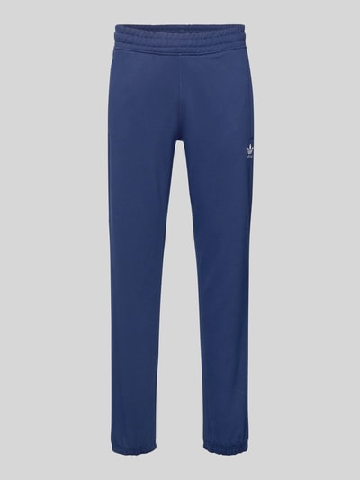 Produktfoto, 'Sweatpants mit elastischem Bund' von adidas Originals, tiefblau, Baumwoll-Mix, lockerer Schnitt, Label-Stitching, französische Eingrifftaschen