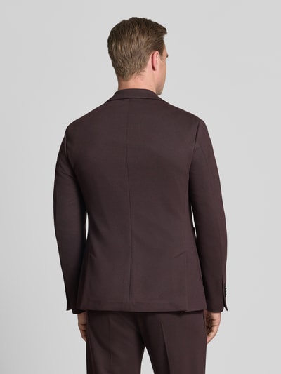 Männermodel trägt Slim Fit Sakko met viscose Model 'Data' van CINQUE in donkerbruin elastische materiaalmix, Ganzkörperansicht Rückansicht.