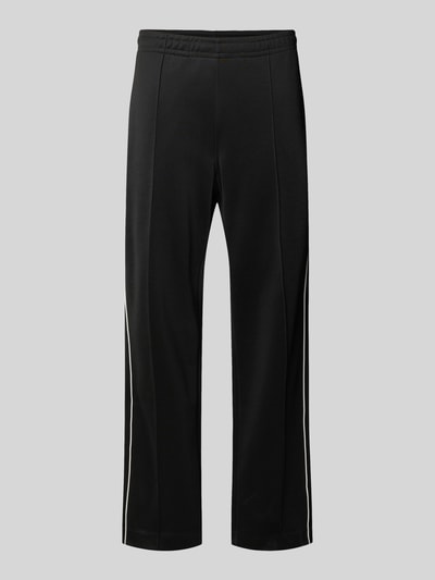 Produktfoto, Regular Fit Sweatpants mit Baumwoll-Anteil von Lacoste, unifarben schwarz, Galonstreifen, elastischer Bund, seitliche Taschen