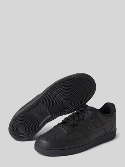 Produktfoto, Herren Sneaker mit abgerundete-Spitze, Schnürung, Modell 'Court Vision Low', Logo, komplett schwarz, Nike, Absatzhöhe: 2 cm, Schafthöhe: 8 cm, Schaftweite: 10 cm, Größe 10,5, glatte Oberfläche, sichtbare Strukturmuster