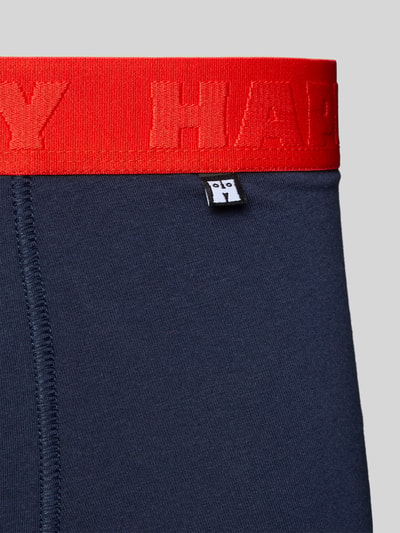 Produktfoto, Trunks mit elastischem Bund im 3er-Pack von Happy Socks in Dunkelblau mit rotem Bund aus Baumwoll-Elasthan-Mix, körpernahe Passform