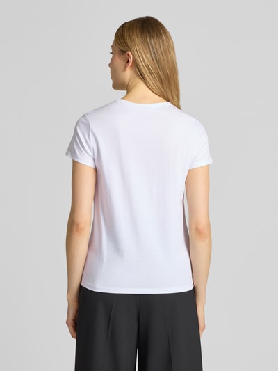 Frauenmodel trägt Regular Fit T-Shirt aus reiner Baumwolle Modell 'Eventsa11' von BOSS, weiß, unifarben, Jersey, Ganzkörperansicht Rückansicht