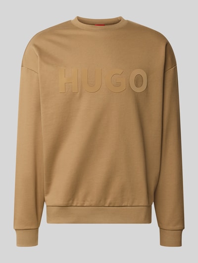 Produktfoto, sandfarbenes Regular Fit Sweatshirt aus reiner Baumwolle Modell 'Dinex' von HUGO, glatte Textur, großer Logoprint vorn