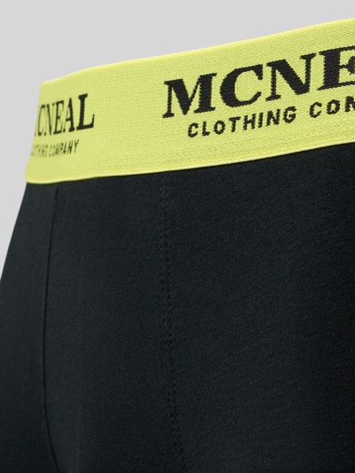 Produktfoto, Slim Fit Trunk mit Logo-Detail im 5er-Pack von MCNEAL, schwarzer Baumwoll-Mix, elastischer gelber Logo-Bund, Herren