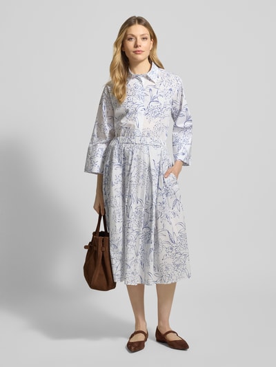 Kobiece modele nosi Spódnica midi im Allover-Look von Gant z bawełny, linia A, elastyczny pas, szerokość w rozmiarze 36: 36 cm, całkowita długość w rozmiarze 36: 75 cm, jasne kolory, delikatny wzór na całej powierzchni, gładka faktura, zdjęcie całej sylwetki z przodu.