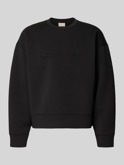 Produktfoto, czarna bluza Sweatshirt mit Rundhalsausschnitt und Logo od CK Calvin Klein, mieszanka materiałów z dodatkiem wiskozy, krój regular fit, okrągły dekolt, logo, długość tyłu w rozmiarze M: 61 cm, długość rękawa w rozmiarze M: 59 cm