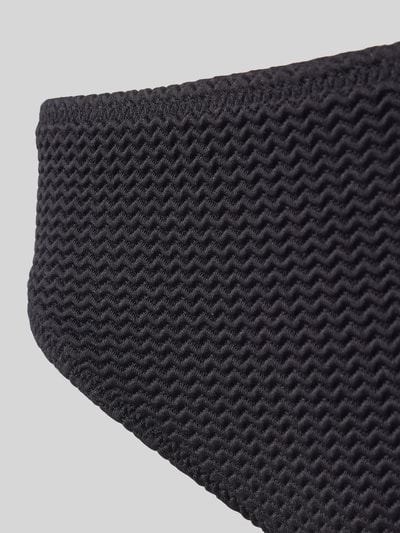 Produktfoto, Bikini-Slip mit elastischem Bund von Seafolly aus schwarzem Material-Mix mit Stretch-Anteil, wellige Textur, körpernaher Schnitt