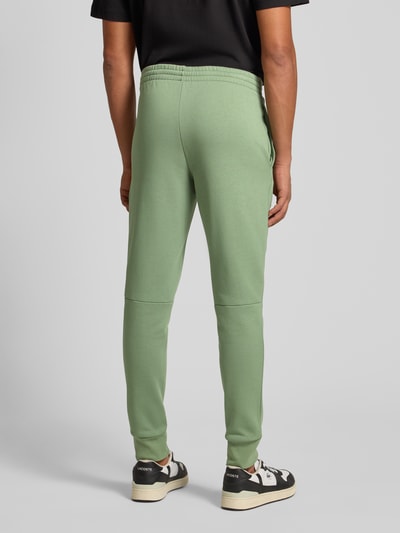 Lacoste Spodnie dresowe o kroju slim fit z mieszanki bawełny Zielony 5