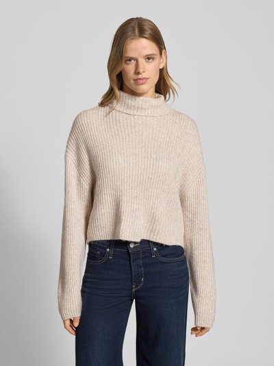 Frauenmodel trägt Relaxed Fit Rollkragenpullover mit Woll-Anteil Modell 'MELANIE' von Only in Melange-Optik, Stricktextur, Nahaufnahme Oberkörper.