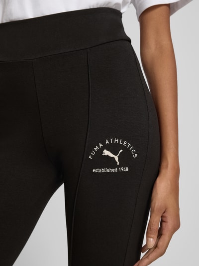 PUMA Slim fit bell bottom met labeldetail Zwart - 3
