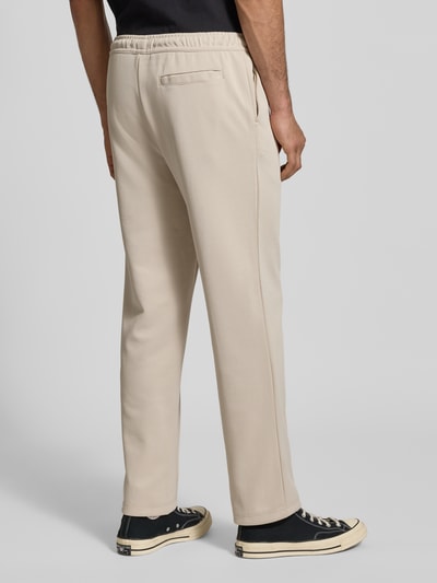 PEGADOR Spodnie dresowe z wyhaftowanym logo model ‘Motus Track Pants’ Écru 5