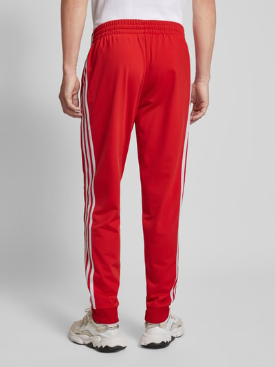 ADIDAS SPORTSWEAR Trainingsanzug mit labeltypischen Streifen Rot 6