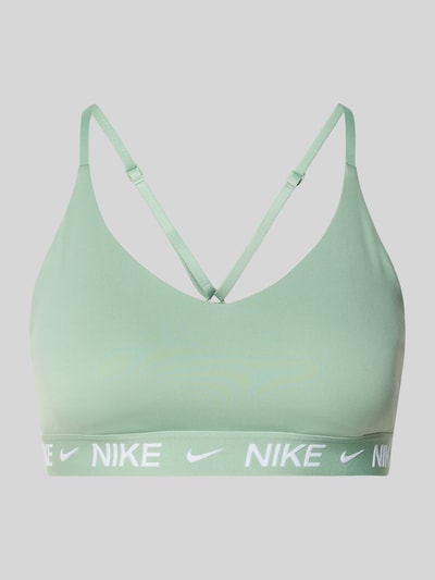 Produktfoto, Slim Fit Sport-BH mit Logo-Print Modell 'Indy' von Nike, elastischer Material-Mix, mintgrün, weiße Logos, glatte Textur.