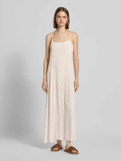Frauenmodel trägt schmal geschnittenes Freizeitkleid aus reiner Viskose Modell 'BARRI' von Pieces mit Optik:Allover-Muster, Maxi-Länge, Henley-Ausschnitt, floralem Muster und Spaghettiträgern, Materialverarbeitung Webware, Farbgebung hell mit dezentem floralen Muster, glatte Textur, Ganzkörperansicht von vorne.