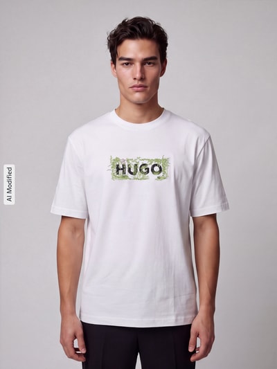 Männermodel trägt Regular Fit T-Shirt aus reiner Baumwolle Modell 'Niviotee' von HUGO, Weiß mit Motiv-Print, Ganzkörperansicht von vorne, KI-modifiziertes Bild.