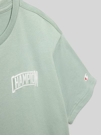 Produktfoto, T-Shirt mit Label-Print und Rundhalsausschnitt von CHAMPION, hellgrün, reine Baumwolle, Regular Fit, Logo-Print, glatte Textur