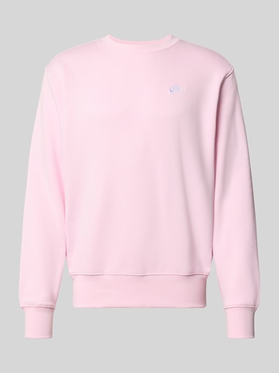 Produktfoto, Relaxed Fit Sweatshirt aus Baumwoll-Mix von Nike in Hellrosa, glatte Struktur, lockere Passform, neutraler Hintergrund