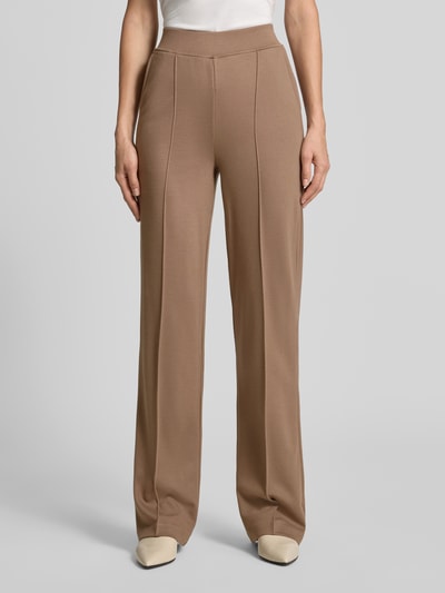 Vrouwenmodel draagt Straight fit broek uit viscosemix van Milano Italy met siernaad, elastische band, bandwijdte maat S 36 cm, binnenbeenlengte 89 cm, frontale close-up