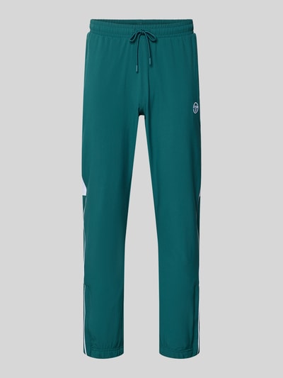 Produktfoto, Sweatpants mit Logo-Stitching Modell 'CASPIO' von SERGIO TACCHINI, zielony, elastyczny materiał z domieszką stretchu, krój slim fit, elastyczny pas ze sznurkiem, boczne kieszenie, logowane przeszycie, elastyczne ściągacze, długość nogawki wewnętrznej w rozmiarze M: 78 cm