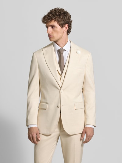 Męski model nosi Slim Fit 2-Knopf-Sakko mit Leinen-Anteil von MCNEAL, mieszanka materiałów, kołnierz z połami, kwiatowy detal, brustasza, kieszenie z patką, długość tyłu w rozmiarze 50: 73 cm, szerokość ramion w rozmiarze 50: 45 cm, długość rękawów w rozmiarze 50: 66 cm; jasnobeżowa marynarka, gładka faktura, krój slim fit, garniturowe formy; ganzkörperansicht z przodu.
