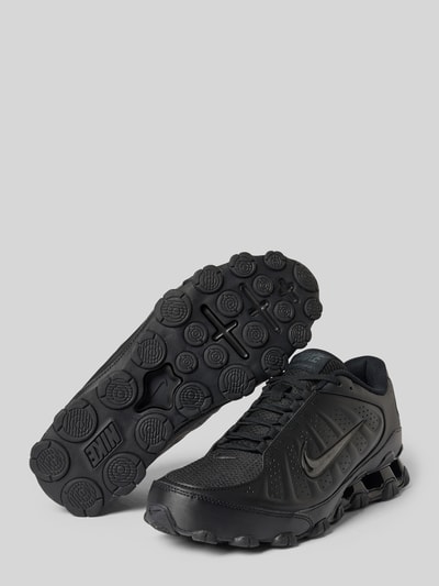 Produktfoto, Sneaker mit Logo-Detail Modell 'REAX 8' von Nike in Schwarz, glatte und strukturierte Texturen, Damen Sneaker von Nike