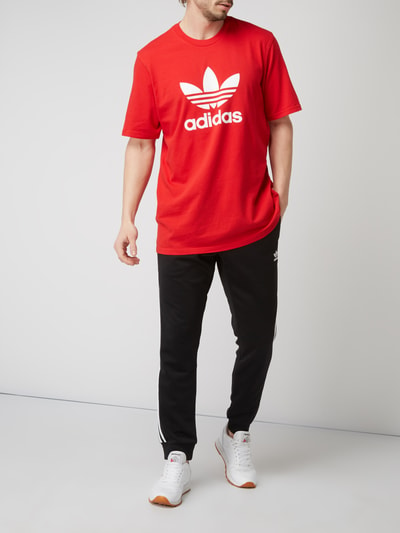 adidas Originals Spodnie dresowe z paskami z logo Czarny 1