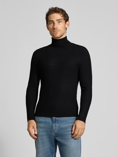Männermodel trägt Rollkragenpullover aus Viskose-Mix in Ripp-Optik von Antony Morato, zwart, slim fit, glad textuur, Ganzkörperansicht von vorne