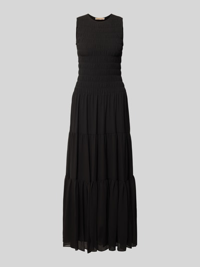 Produktfoto, Maxikleid mit Smok-Details und Volantsaum von MICHAEL Michael Kors in Schwarz, taillierter Schnitt, Rundhalsausschnitt, feine Stoffstruktur
