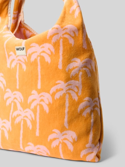 Produktfoto, Umhängetasche mit Label-Patch Modell 'Tenerife' von WOUF aus reiner Bio-Baumwolle in Orange mit rosa Palmenmuster, rechteckige Form, strukturierte Textur, Maße 39x38x2 cm, langer Schulterriemen