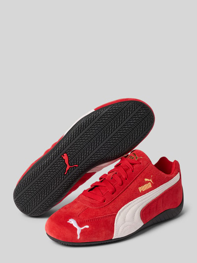 Produktfoto, Sneaker aus echtem Leder Modell 'Speedcat' von PUMA in Rot mit weißem Logo-Detail, glatter Sohle, abgerundete Passform