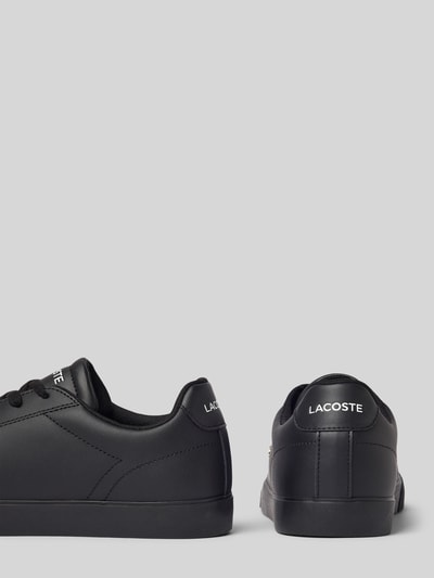 Productfoto, zwarte kleuren, gladde textuur, strakke lijnen, sneakers van echt leer model 'LEROND SET' van Lacoste, Heren sneakers