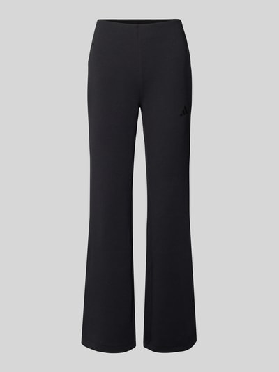 Produktfoto, Flared Sweatpants mit Logo von adidas Sportswear z mieszanki materiałów z domieszką modalu, rozkloszowany krój, elastyczny pas, długość wewnętrzna 82 cm w rozmiarze S, kolor czarny, gładka tekstura