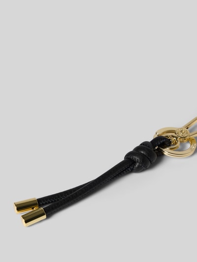 Productfoto, hanger met knoopdetail van Abro, goudkleurige en zwarte tinten, karabijnhaak, Label in reliëf, Dames