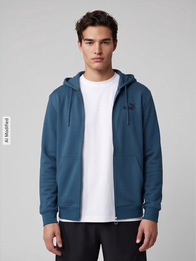 Männermodel trägt Regular Fit Sweatjacke aus Baumwoll-Mix von PUMA Performance in Dunkelblau, glatte Textur, Ganzkörperansicht von vorne, KI-modifiziertes Bild