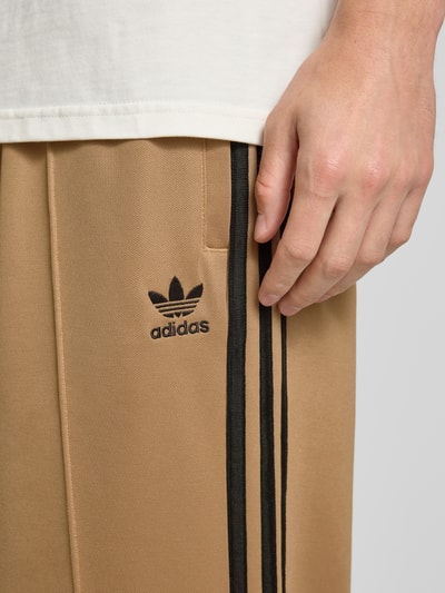adidas Originals Spodnie treningowe ze szwami podłużnymi i elastycznym pasem Średniobrązowy 3