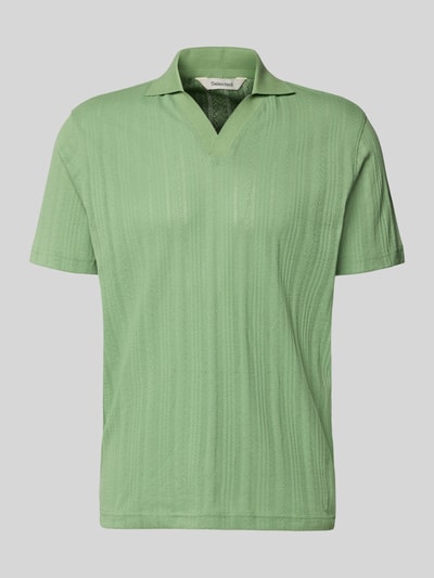 Produktfoto, Regular Fit Poloshirt aus Baumwoll-Mix Modell 'TRAVIS' von SELECTED HOMME, Optik: Unifarben, Struktur, Polokragen, V-Ausschnitt, kurze Knopfleiste, Kurzarm, Materialverarbeitung: Jacquard, dezentes Grün mit feiner Struktur.