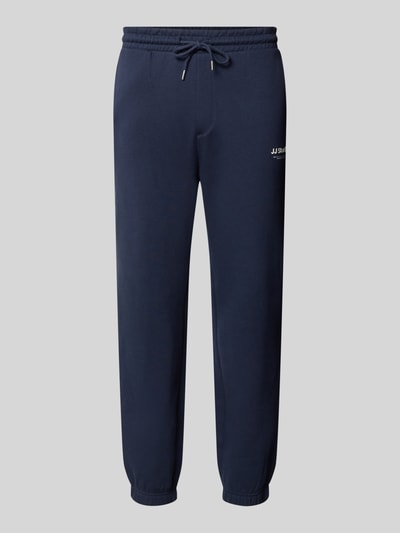 Produktfoto, Straight Fit Sweatpants aus Baumwoll-Mix Modell 'Kane' von JACK & JONES in Dunkelblau mit Logo-Detail, elastischer Bund und Beinabschlüssen, Gesäßtasche, für Herren