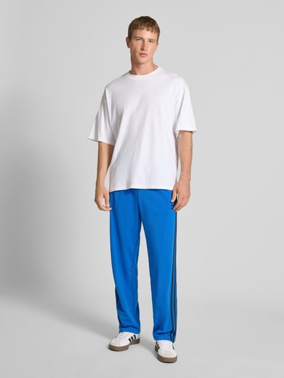 adidas Originals Regular fit sweatpants met logostitching, model 'Firebird' Donkerblauw - 1
