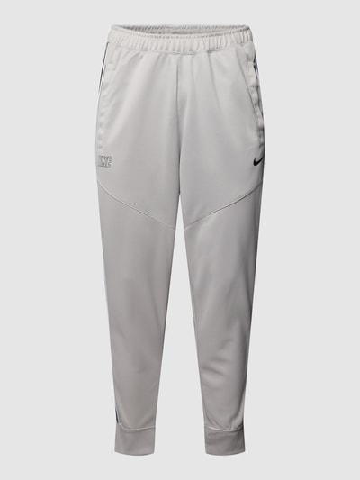 Nike Spodnie dresowe z lampasami Jasnoszary 2