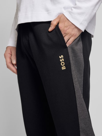 BOSS Tapered fit sweatpants met tunnelkoord, model 'Tracksuit' Zwart - 3