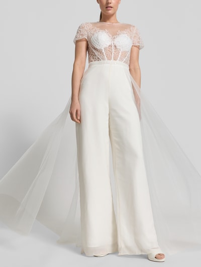 Frauenmodel trägt Jumpsuit mit Perlen und rückseitigem Cut Out von Unique, Semitransparent, Regular-Fit, Ganzkörperansicht von vorne, Kontext: Damen Jumpsuit, Hakenverschluss, Rückenlänge 40 cm, Brustweite 38 cm, Ärmellänge 17 cm, Gesamtlänge 162 cm, Innenbeinlänge 86 cm, Größe 36.