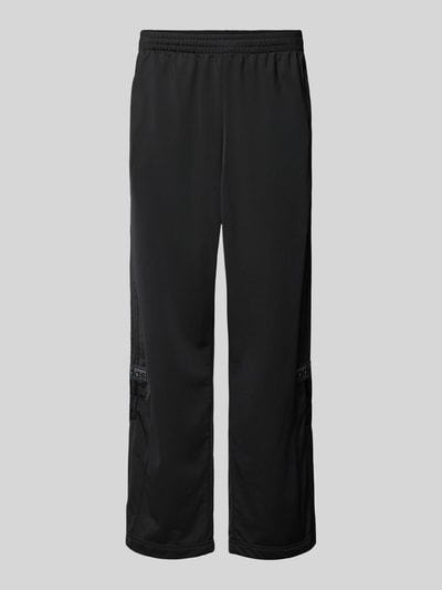 Produktfoto, Sweatpants mit elastischem Bund von adidas Originals in Schwarz mit lockerer Passform und Eingrifftaschen, glatte Textur