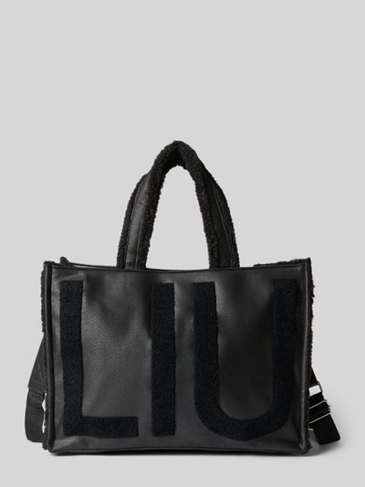 Produktfoto, Tote Bag mit Logo-Detail Modell 'Montone' von Liu Jo White, schwarze Lederoptik, Teddyfellbesatz, rechteckige Form, sichtbares Liu Jo Logo, Maße 41x30x20 cm, Schulterriemen 42 cm, Hauptfach mit Reißverschluss.