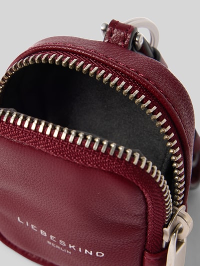 Produktfoto, Keyring Pouch mit Rundum-Reißverschluss von LIEBESKIND BERLIN w kolorze bordowym, skóra ekologiczna, nadruk z logo, regulowany brelok