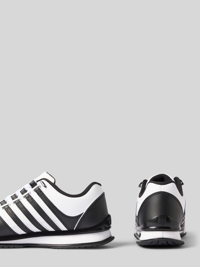 Produktfoto, Sneaker aus leer met labeldetails model 'Rinzler' van K-SWISS voor heren, gecoat leer, afgerond model, profielzool, zwart-wit, maat 44 hakhoogte 3 cm, schachthoogte 9 cm, schachtbreedte 9 cm