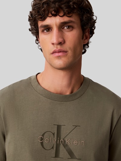 Calvin Klein Jeans Relaxed fit T-shirt van puur katoen met logoprint Kaki - 3